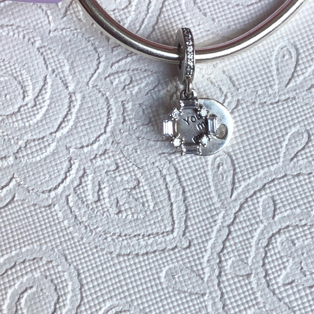 Pandora ice carving charm